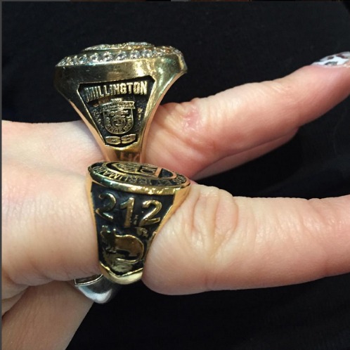 That's me wearing Akim's giant championship ring next to my own No Class ring.