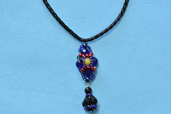 final look of the blue bead pendant necklace with black leather cords