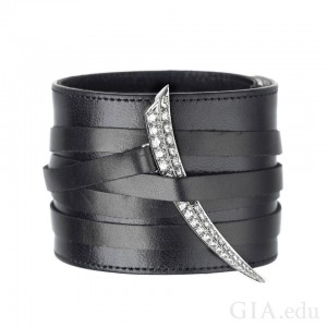 Shaun Leane’s 18ct White Gold Sabre Tusk with Black Calf Leather Wrap looks like it would be perfect on an actress in The Hunger Games. Courtesy: 1stdibs.com