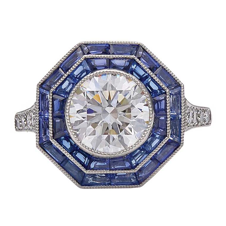 Vintage engagement ring by Tiffany & Co. with sapphires and diamonds in platinum, available on 1stdibs.com (£25,620).