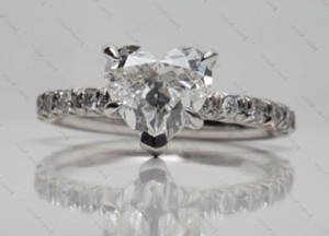 5 prong clawed heart cut diamond ring