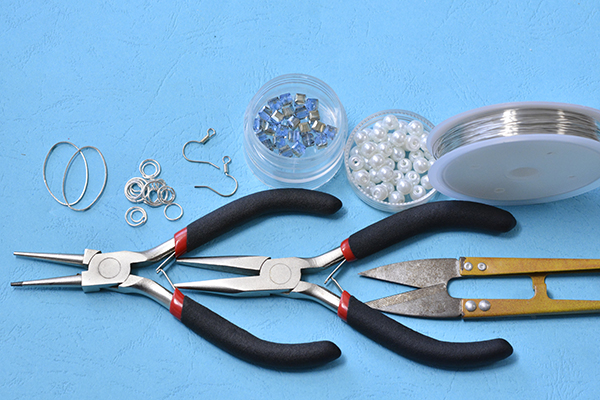Materials and tools needed in making the simple blue crystal hoop drop earrings:
