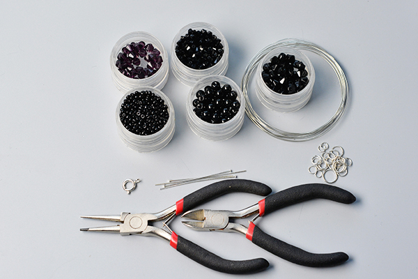 Supplies needed for this chic black glass beads necklace: