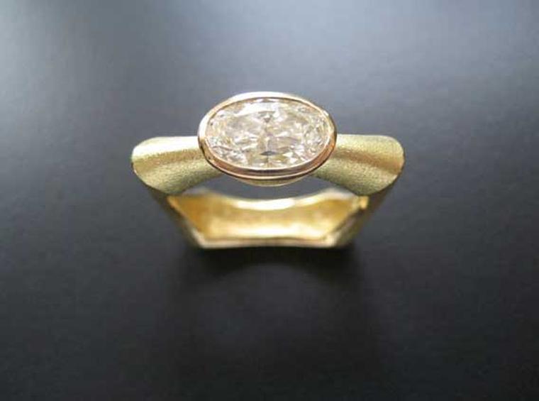 Alexandra Hart Shoulderring  sculptural gold engagement ring. Alexandra has been working to promote socially and ecologically responsible business practices to artists and consumers since the launch of her business in 1995.