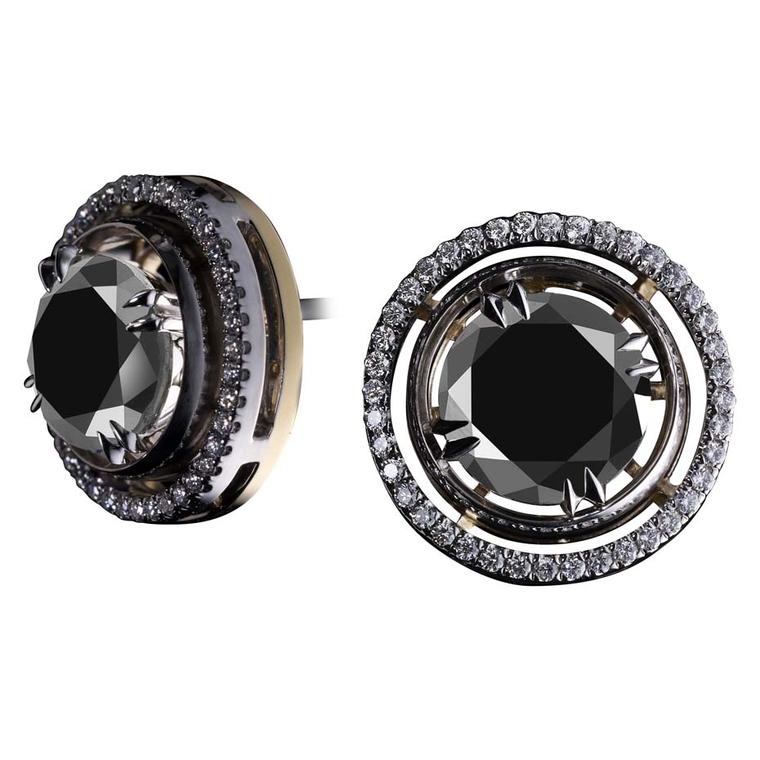 Alexandra Mor's limited edition black diamond stud earrings are available in yellow or white gold, encircled by round diamonds.