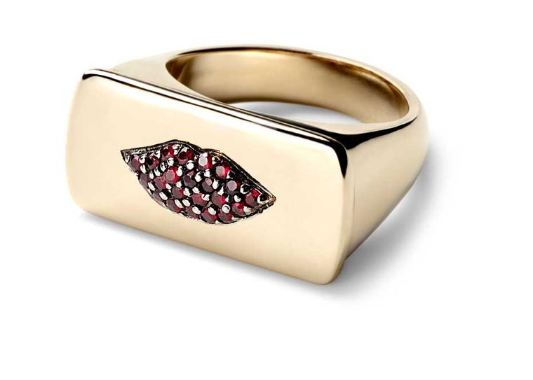 The Alison Lou Ruby Lips ring features puckered lips adorned with pavé rubies.