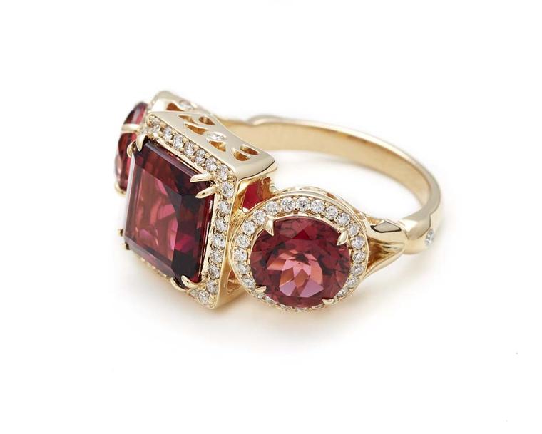Anna Sheffield Astarte ring, set with two rose-cut pink tourmalines and a central princess-cut pink tourmaline in yellow gold