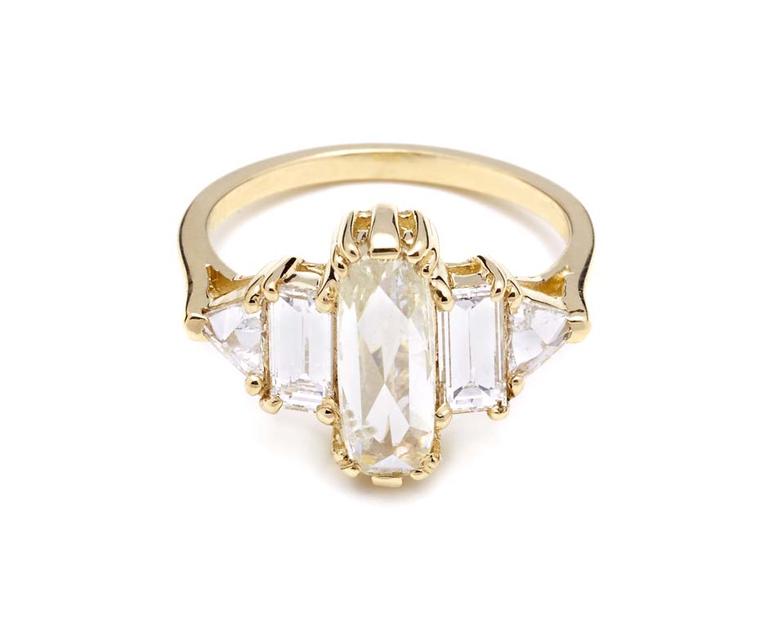 Anna Sheffield Theda ring, with a central elongated rose-cut pale yellow diamond flanked by four white diamonds in yellow gold