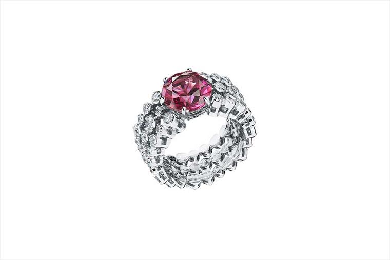 Alexander Arne diamond ring in white gold, set with a central almandine garnet, from the Awakening collection.
