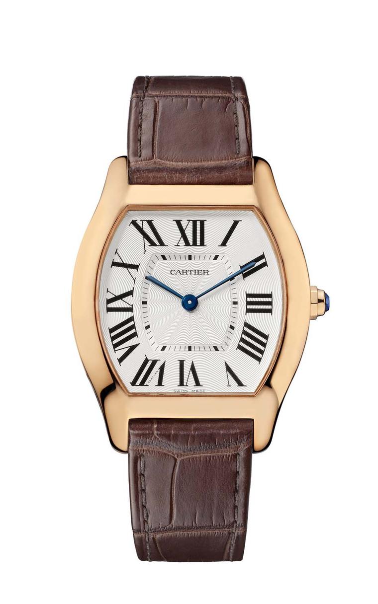 Cartier's Tortue watch medium model in pink gold with an alligator skin strap.