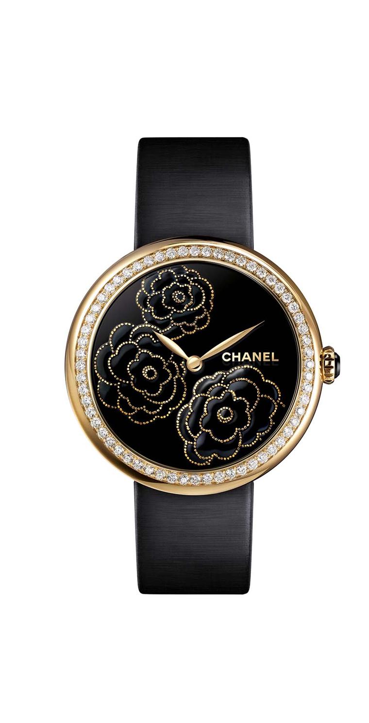Chanel Mademoiselle Privé Camellia Maki-e watch in yellow gold and diamonds. The face is crafted using the ancient Japanese technique of Maki-e in black lacquer and yellow gold