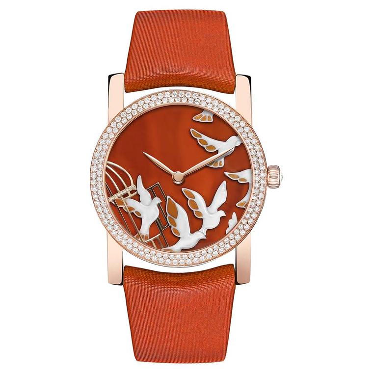 Chaumet's Attrape-moi…si tu m’aimes collection watch dial displays a group of doves sculpted from white agate