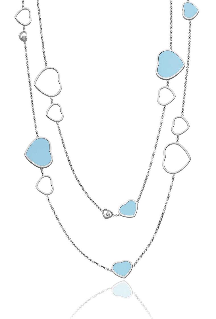 Chopard Happy Hearts necklace in white gold with turquoise and mobile diamonds dotted along the chain.