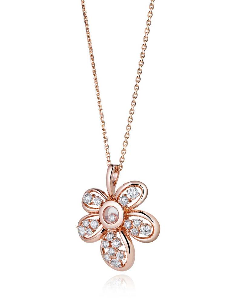 Chopard floral diamond necklace in rose gold, set with a floating diamond in the centre surrounded by 19 diamonds, new to the the Happy Diamonds collection.