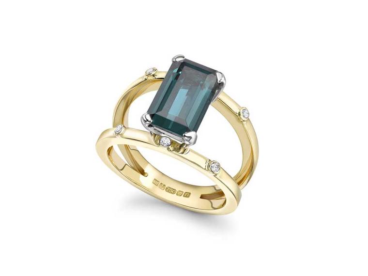 Emma Franklin tourmaline engagement ring in yellow gold, with a suspended emerald-cut tourmaline and six small diamonds.