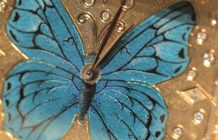 A close-up look at the hand-painted enamel wings on DeLaneau's one-of-a-kind Dôme Butterfly watch