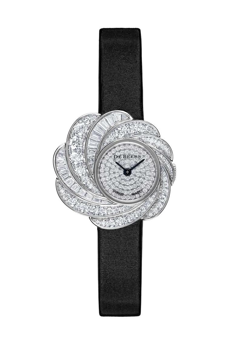De Beers Aria diamond watch set with round brilliant and baguette-cut diamonds totalling 2.54ct in white gold, with a fully diamond pavéd dial and a black satin strap (£POA).