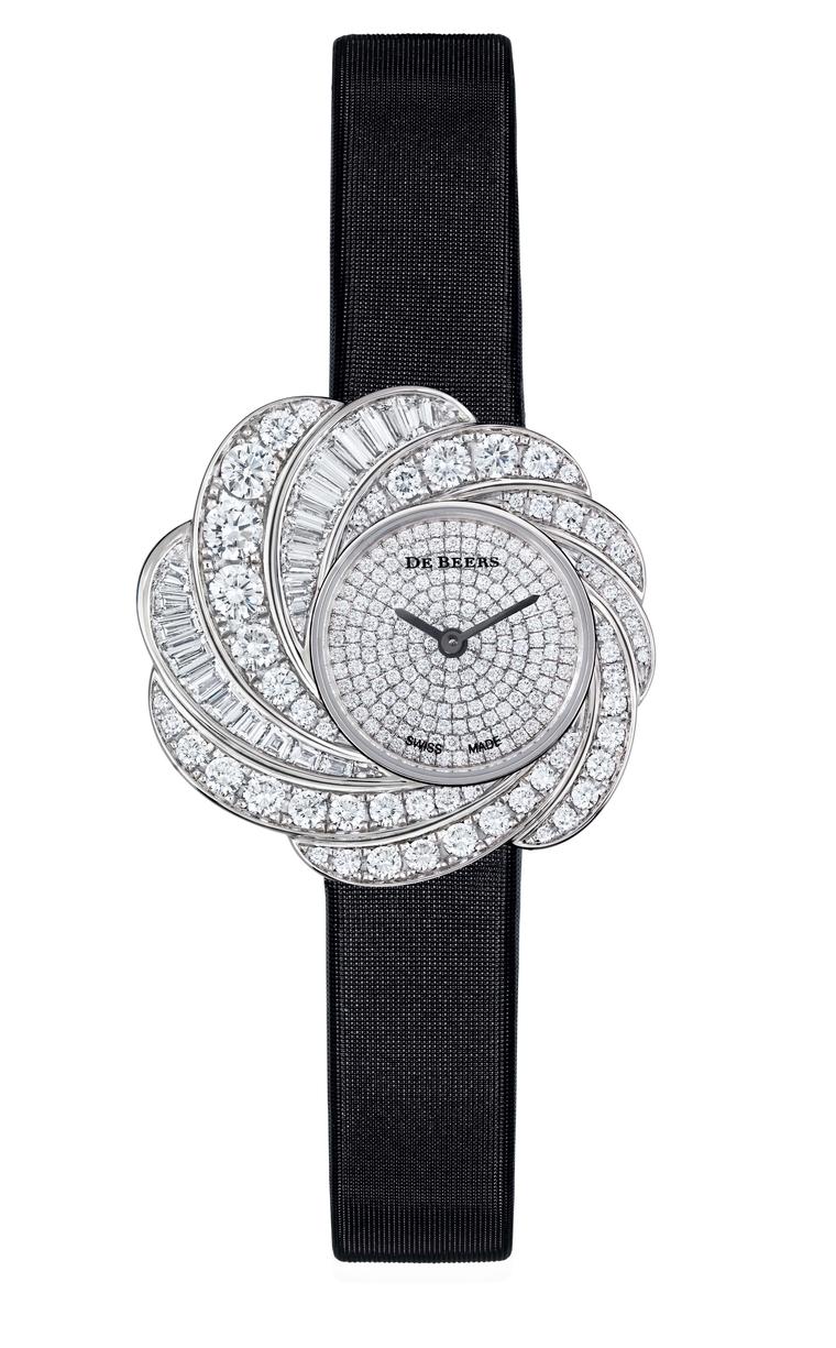 De Beers Aria diamond watch set with round brilliant and baguette-cut diamonds totalling 4.35ct in white gold, with a fully diamond pavéd dial and black satin strap (£POA).
