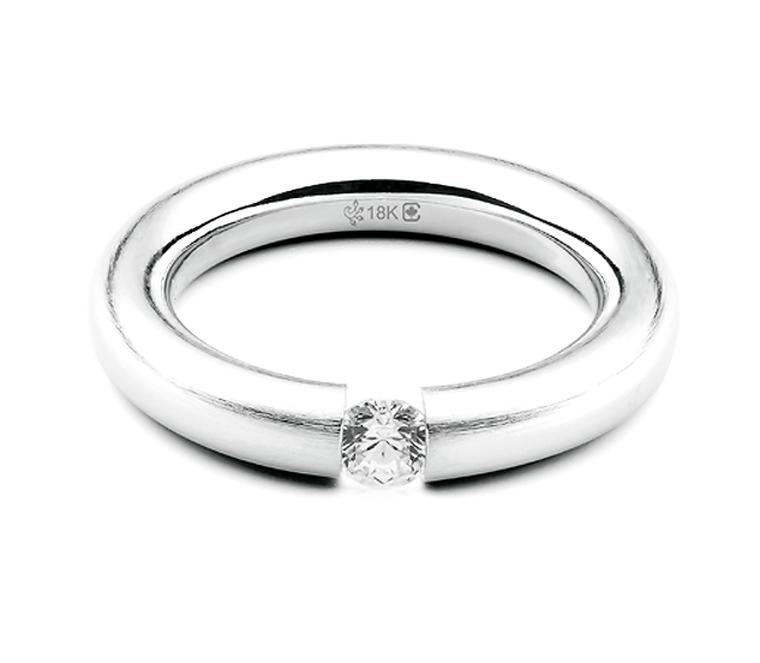 Fair Trade Jewellery Company Torus Tension Set Solitaire diamond engagement ring, featuring a fully traceable 0.25 carat Canadian diamond ($4,295) or, at an additional charge, a rare Sirius Star diamond.