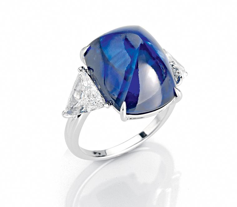 One-of-a-kind Faraone ring in platinum, set with a sugarloaf cabochon sapphire.