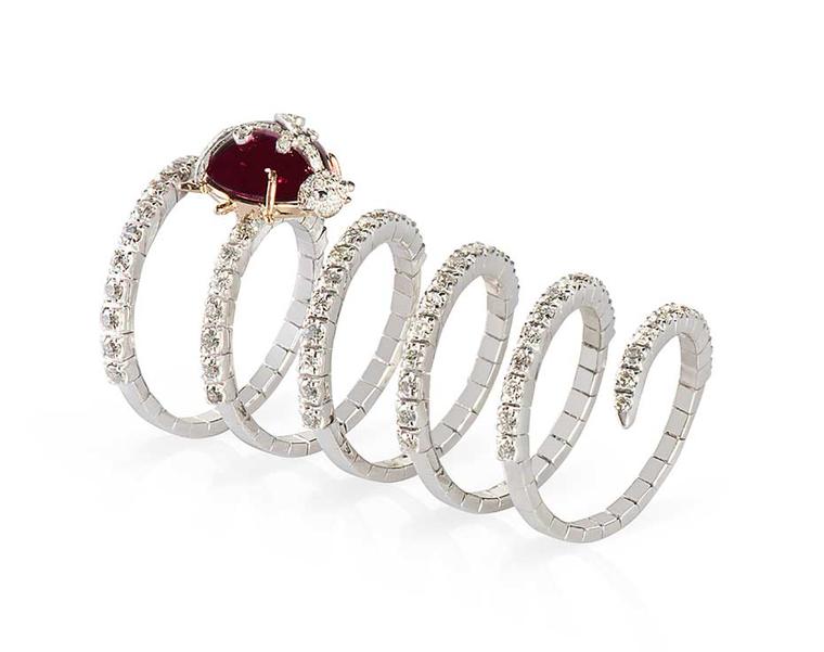 Gismondi Ladybug ruby ring in 18ct gold with diamonds the Twirl collection.