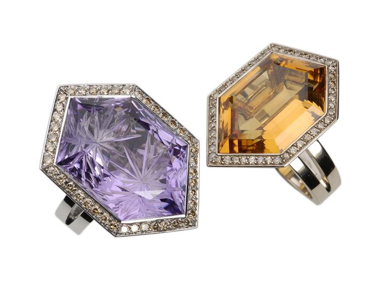CADA Hexagon rings in white gold. The ring on the left is set with an amethyst surrounded by brown diamonds and the ring on the right features a citrine surrounded by brown diamonds.