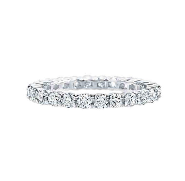 Harry Winston eternity ring in platinum, prong-set with 26 round brilliant diamonds.