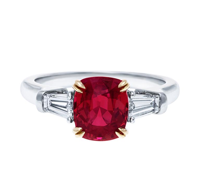 Harry Winston Classic Winston cushion-cut ruby engagement ring with tapered baguette diamond side stones set in platinum and a yellow gold setting.