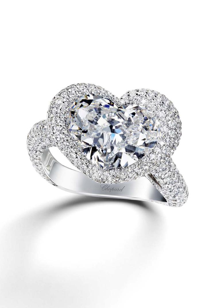 Chopard Passion for Happiness diamond engagement ring featuring a 5.63ct heart-cut diamond surrounded by smaller diamonds.