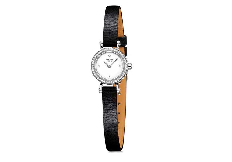 Hermès Faubourg watch featuring a diamond bezel.