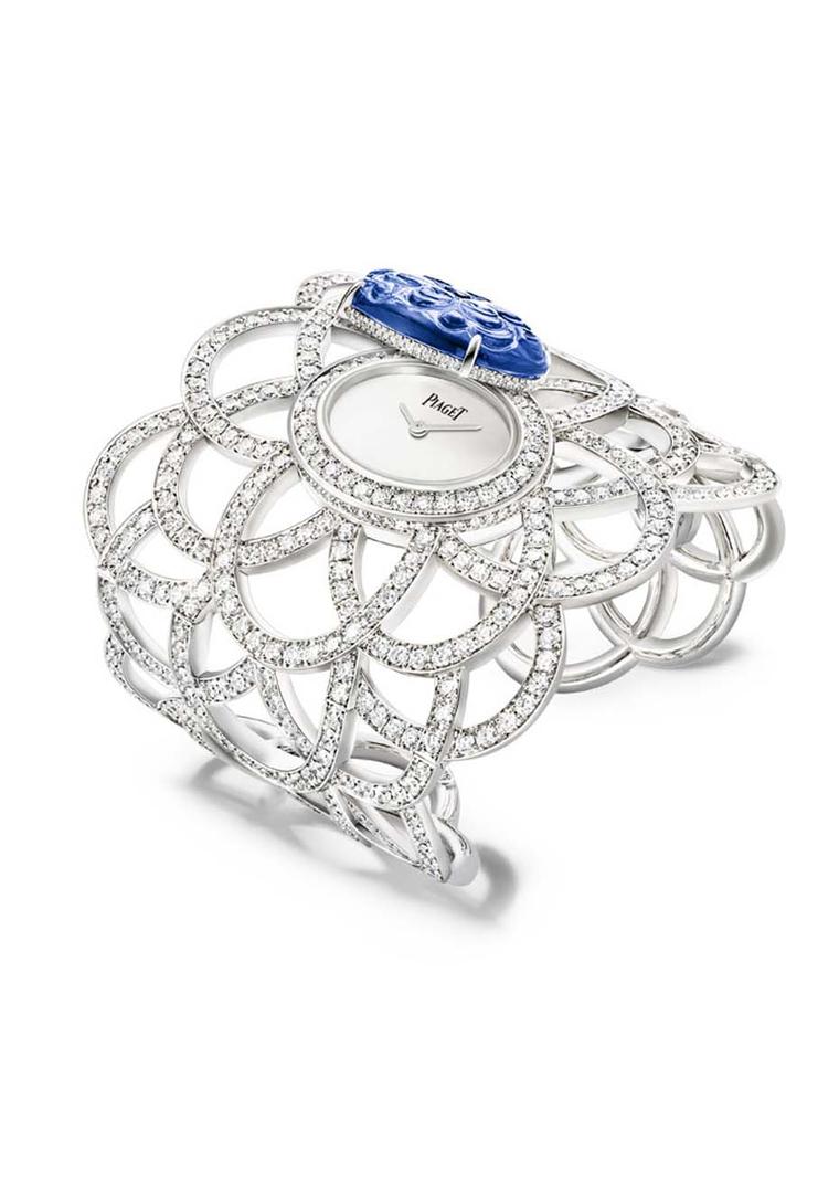 Piaget's Secret watch, from the new Extremely Piaget high jewellery collection, sits on the wrist in a lacey cuff studded with 601 brilliant-cut diamonds and a natural blue opal dial set into an oval-shaped bracelet snow-set with 1,699 diamonds.