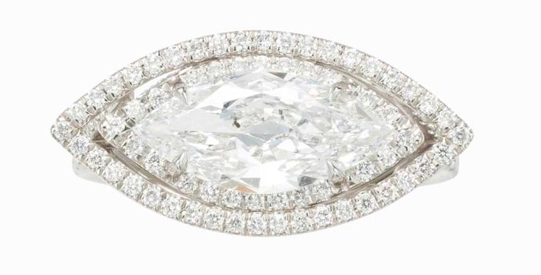 This Monique Péan platinum and diamond ring features a marquise-cut diamond within a micro pavé-set, circular-cut diamond surround.