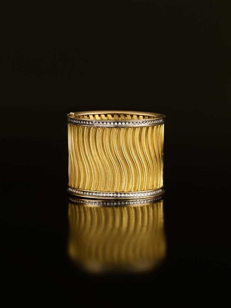 Liv Ballard Collection Cisterna Cuff in pleated yellow gold with pavé diamonds.