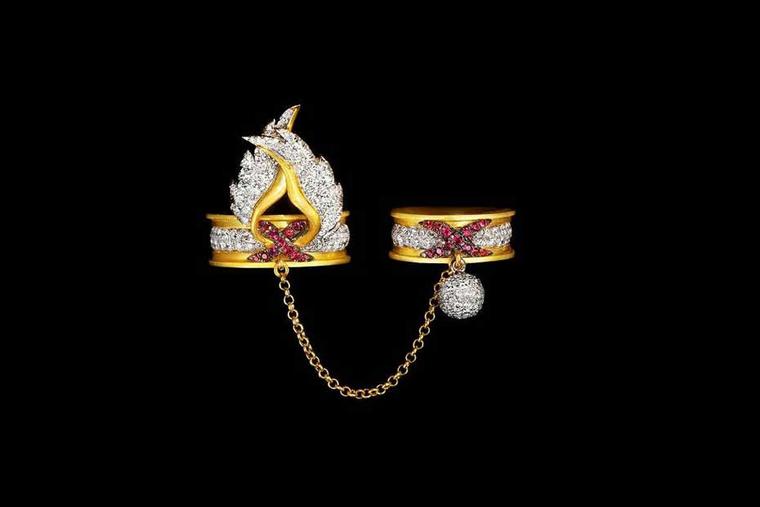 Liv Ballard Sacro Vincolo Alato yellow gold and diamond linked rings with ruby accents.