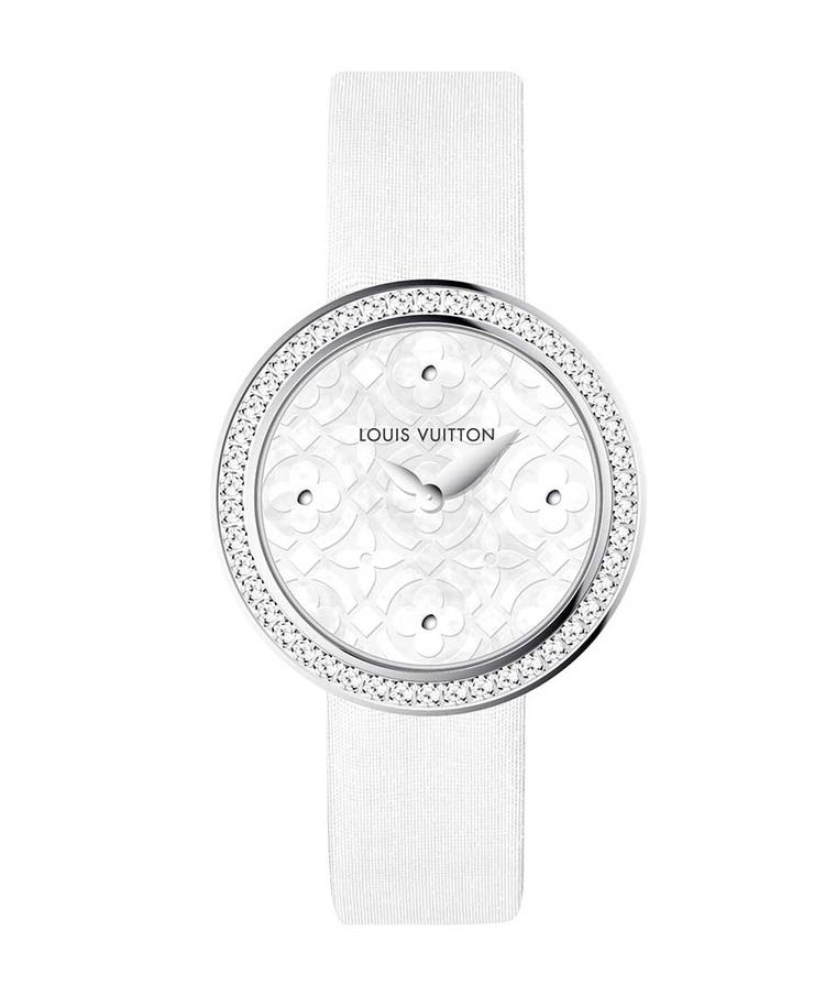 New for 2014 is the Louis Vuitton Dentelle de Monogram watch with a pearly white mother-of-pearl dial, diamond-set bezel and white satin strap