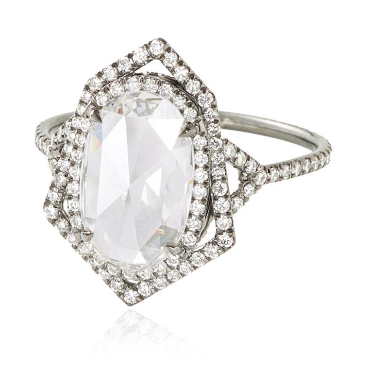 Monique Péan Mineraux collection engagement ring in recycled oxidised platinum, set with an antique white oval rose-cut diamond and diamond pavé.