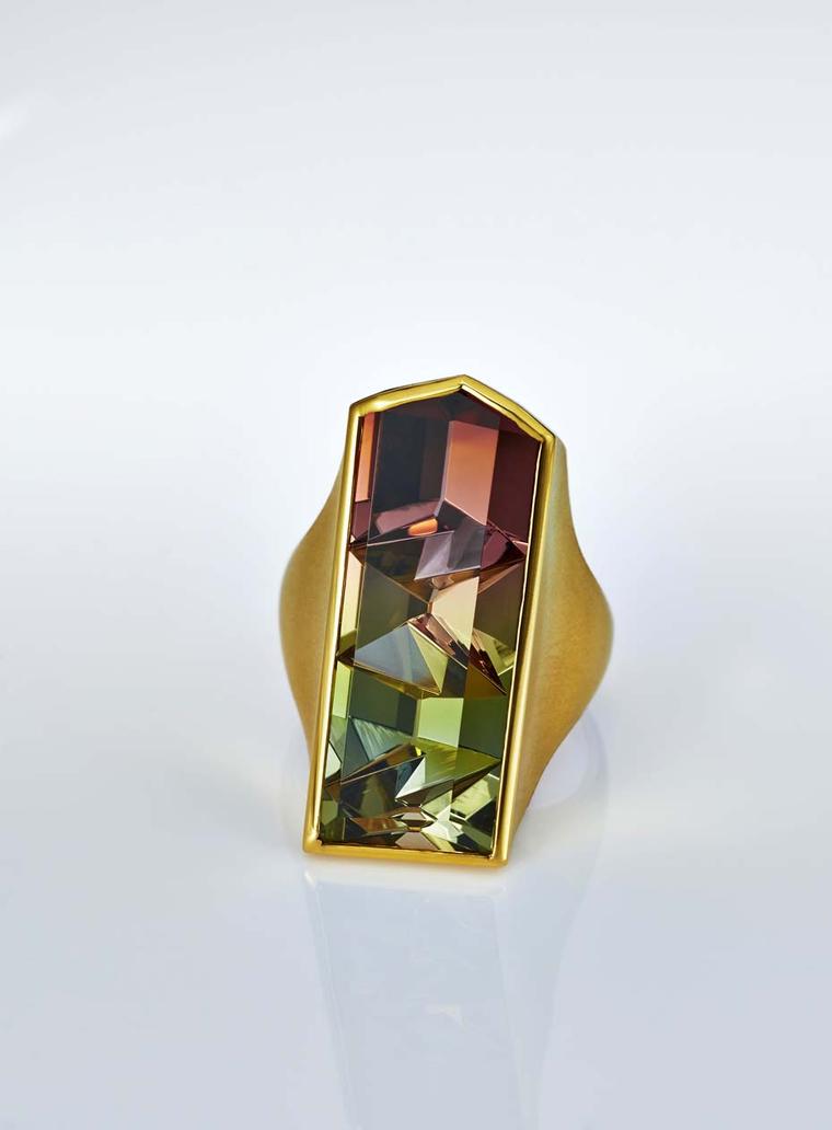 Atelier Munsteiner ring with a bi-colour tourmaline set in yellow gold.