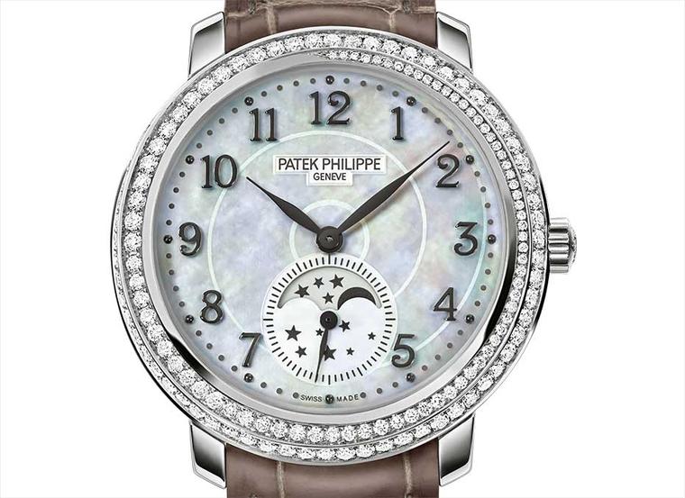 The sparkling ribbon of diamonds and ever-changing hues of the mother-of-pearl dial on the new Patek Philippe Ref. 4968G-010 Moon phase watch for women capture the beauty of the cosmos
