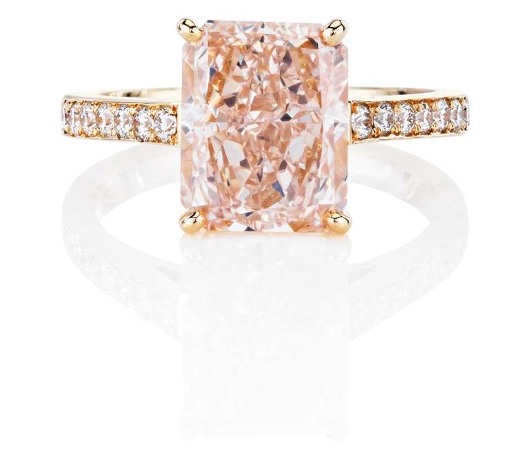 De Beers Classic pink diamond engagement ring, from the 1888 Master Diamonds collection, set with a Fancy pink diamond with pavé white diamonds around the band.
