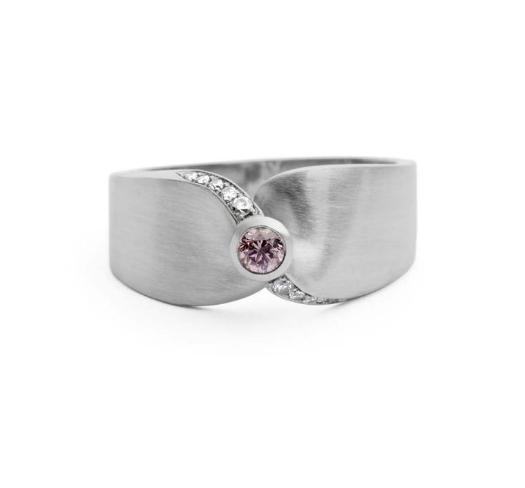 Jessica Poole Twist pink diamond engagement ring set with a natural pink diamond and pavé white diamonds (from £2,400).