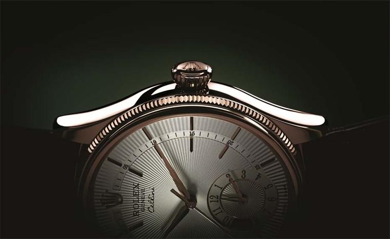 The dials of the new Rolex Cellini watches, including this Dual Time model, are either lacquered or decorated with a black or silver-plated 'Rayon flammé de la gloire' guilloché motif