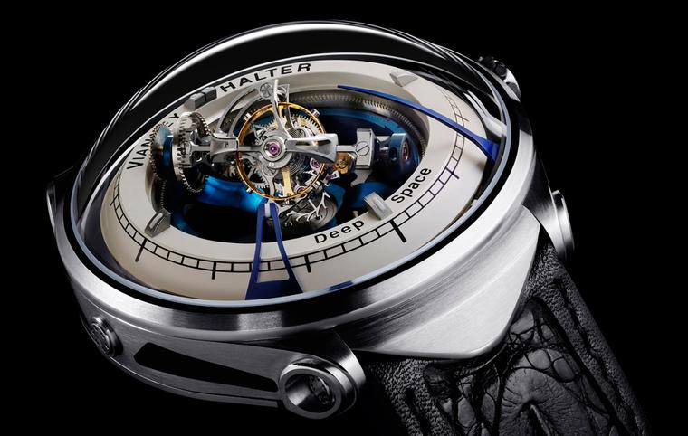 Vianney Halter Deep Space Tourbillon watch indicates the time with two blue curved nails: the longer nail indicated the minutes, the shorter one is for the hours.