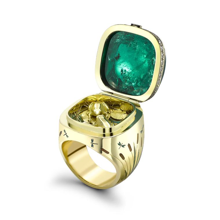 Theo Fennell's Kissing Frogs African emerald ring opens to reveal a pair of gold frogs.