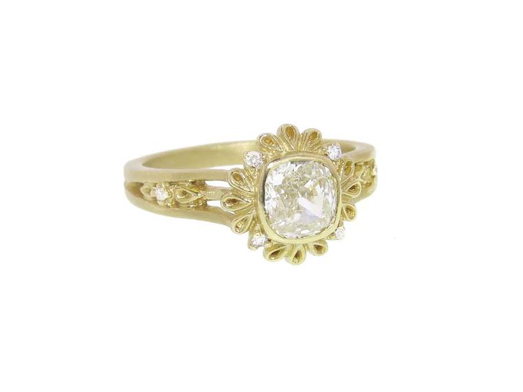 Megan Thorne's detailed Plume engagement ring in yellow gold featuring a cushion-cut diamond.