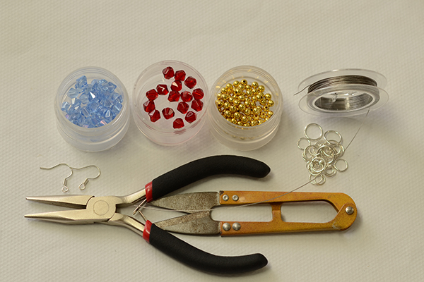 Supplies in making the glass beaded cross earrings: