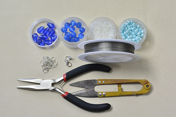 Supplies in making the ocean inspired glass and pearl beaded collar necklace: