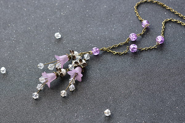 final look of the purple flower pendant necklace with antique bronze chain