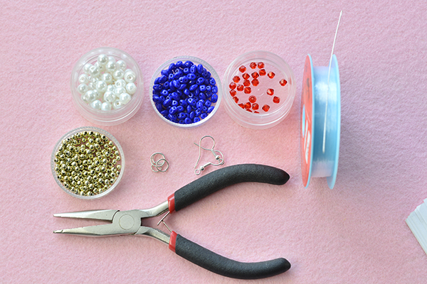 Materials needed for the beading earrings with pearl and 2-hole seed beads: