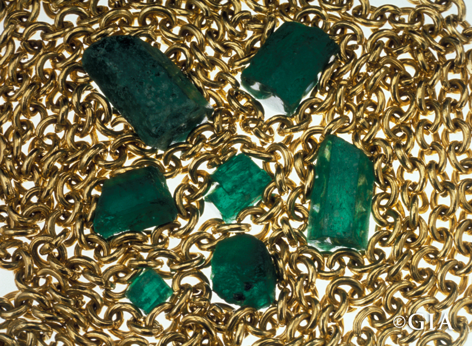 The riches of the New World on display: A gold chain and emeralds from the Atocha. Photo by Shane F. McClure/GIA.