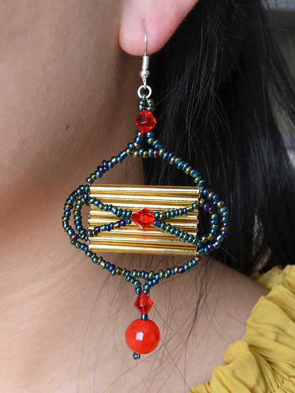 I'm showing off the beauty of this pair of Chinese style seed bead lamp drop earrings!